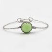 Hard silver bracelet inlaid with green opalite