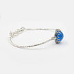 Hard silver bracelet inlaid with blue opalite