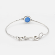Hard silver bracelet inlaid with blue opalite