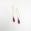 Necklace earrings with purple cake